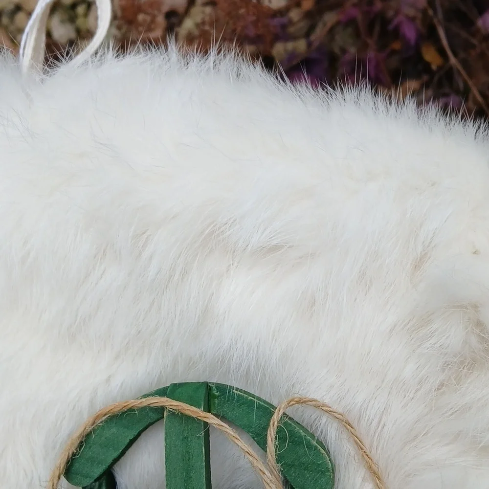 White Rabbit Fur Christmas Stocking with Red and Green Sled